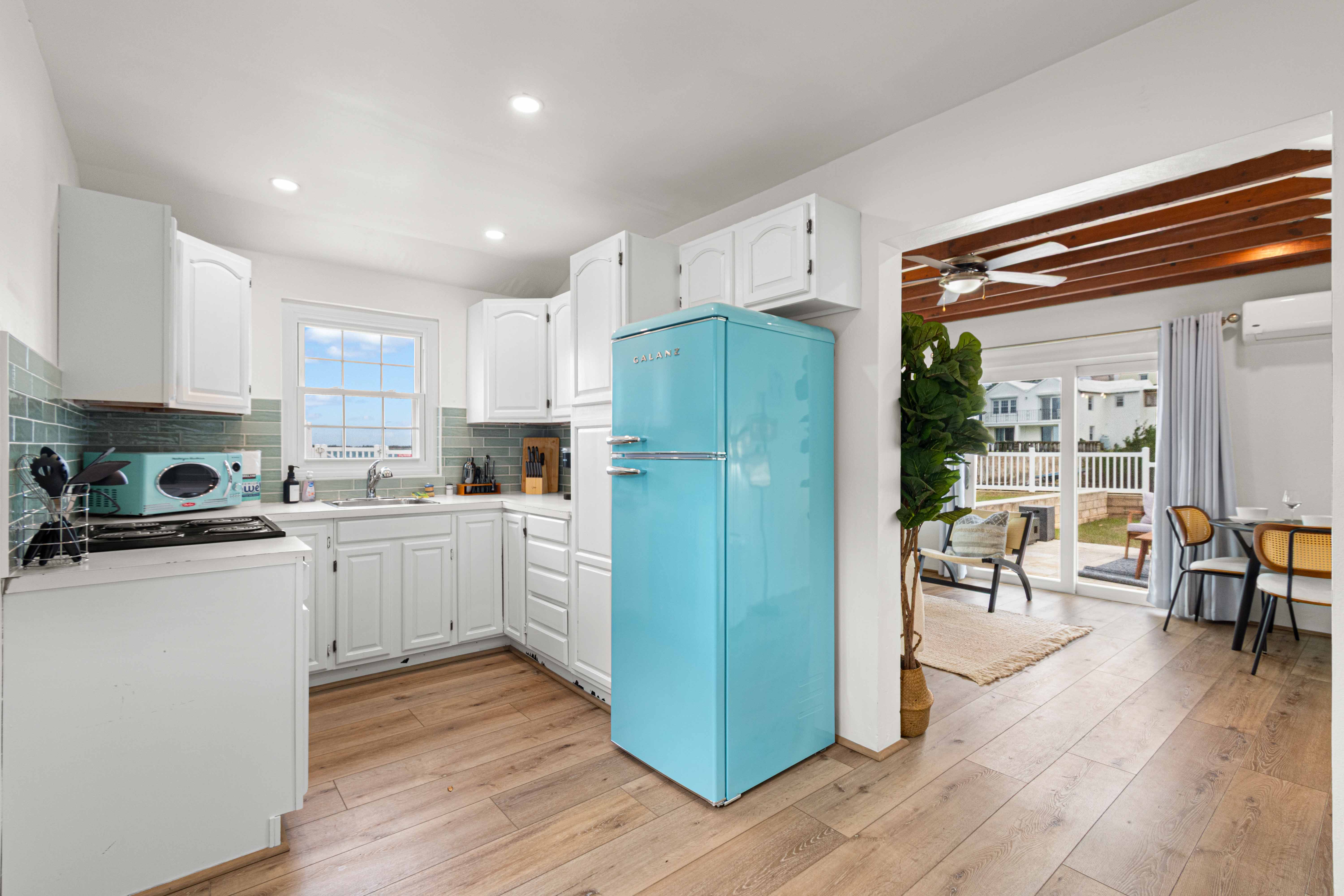 Kitchen with turquoise fridge